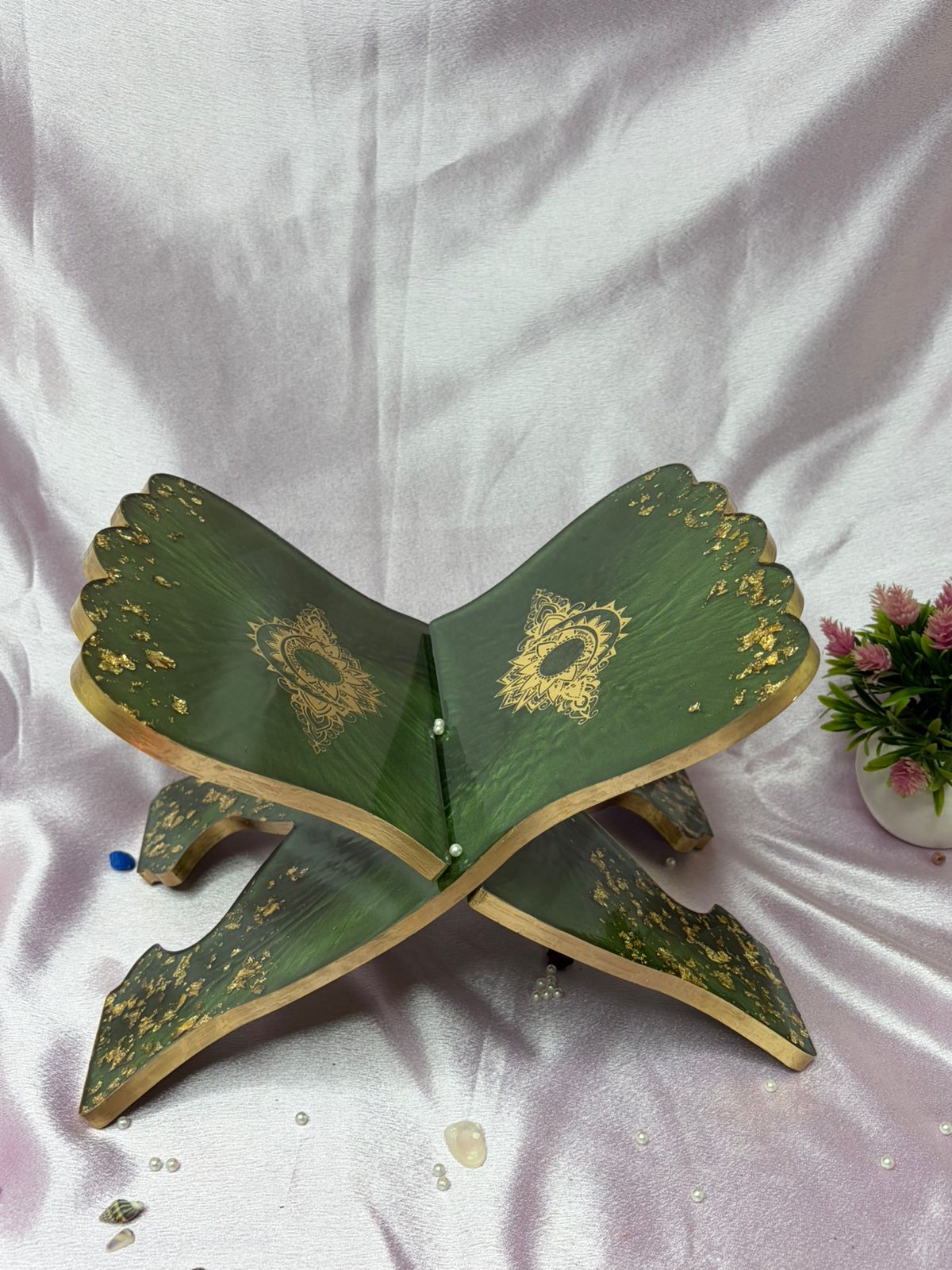 Ornate green and gold Quran stand