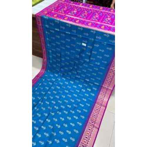 Ocean Blue Soft Silk Saree – Bright blue base highlighted with delicate woven motifs and a vibrant pink border.