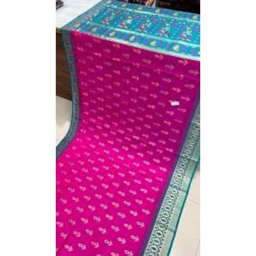 Rani Pink Soft Silk Saree – Rich pink shade adorned with fine butti weaving and a graceful turquoise border.