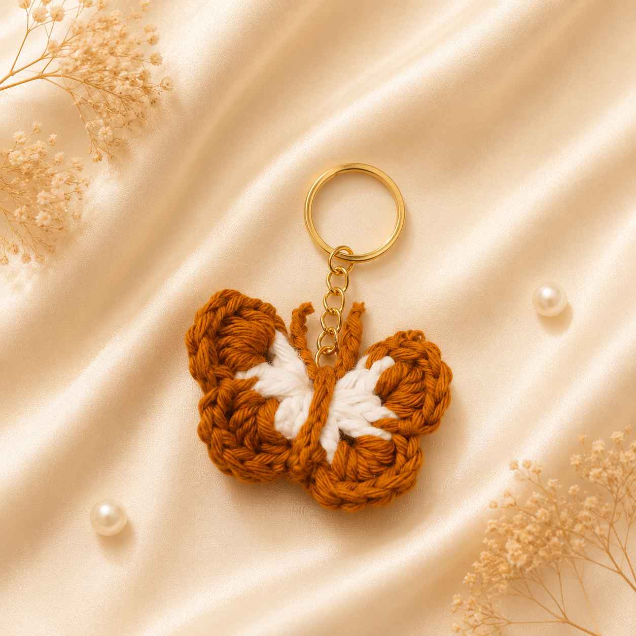 Crocheted butterfly keychain